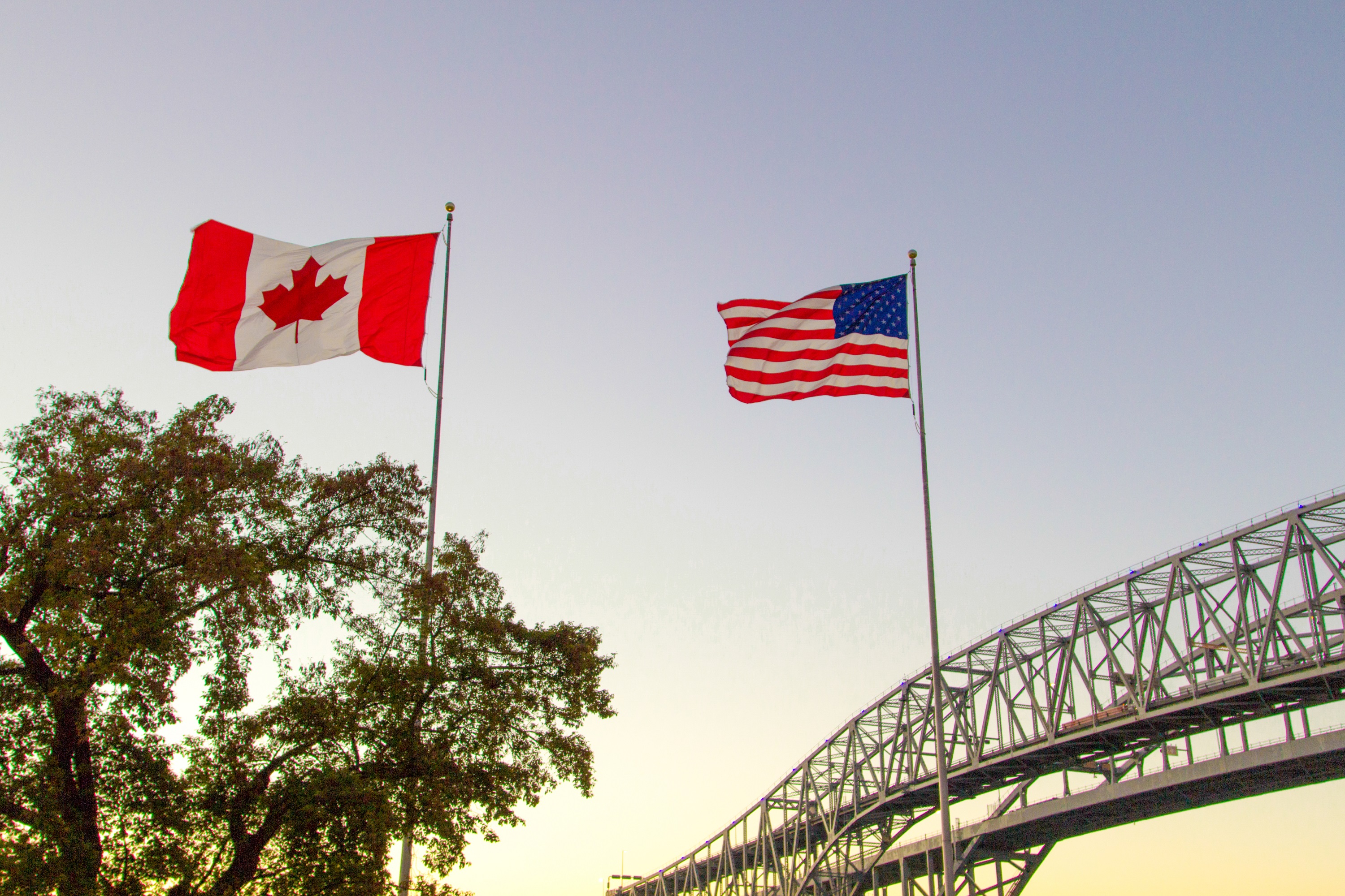 US and Canada Flag with Bridge